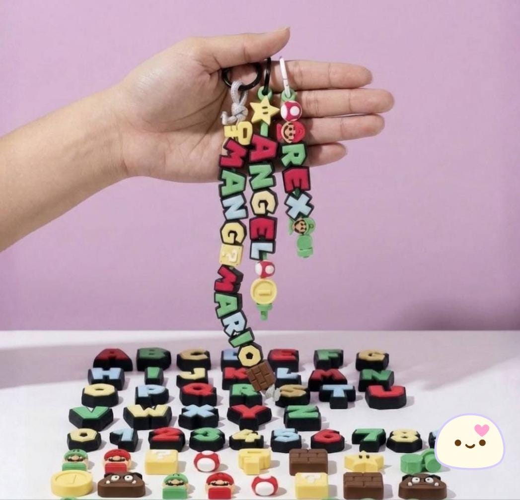 3D printed letter beads and icon charms detail