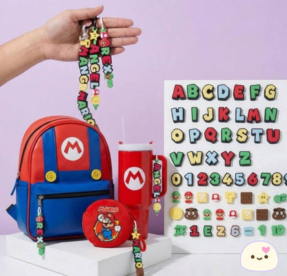 Custom name keychain with game-inspired icons on backpack
